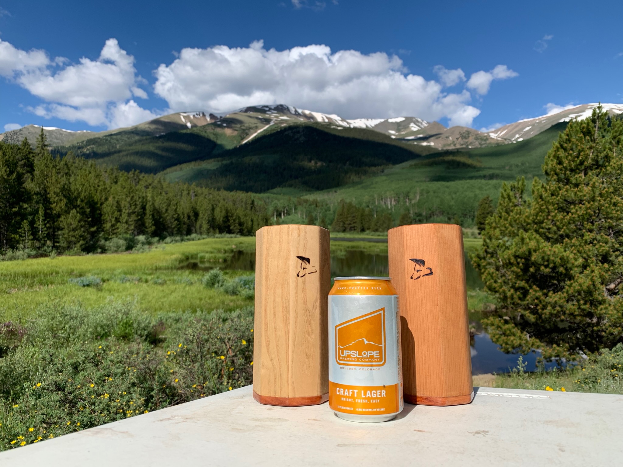 PintWood and WhiskeyWood cups with Rocky Mountain backdrop